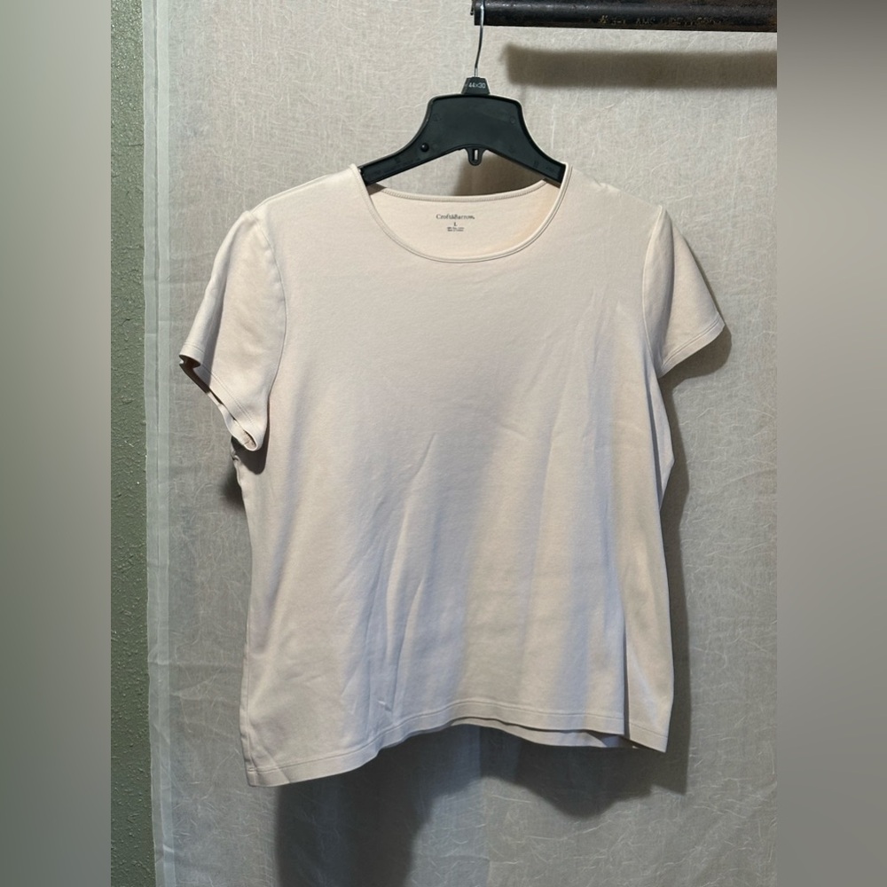 Casual T. Soft with shiny piping along the neck line.